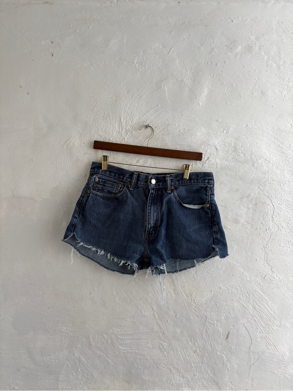 Womans customized dark wash Levi shorts